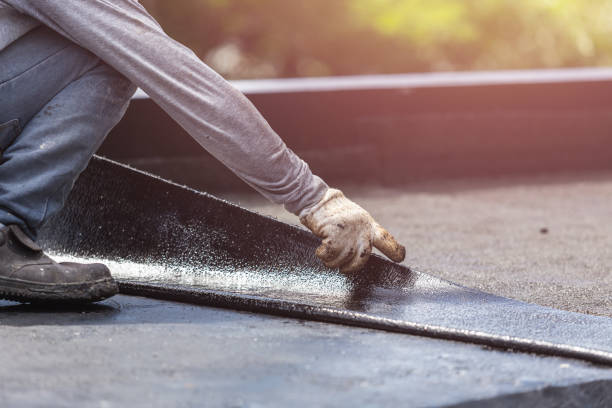 Professional Basement Waterproofing technician working in Harveysburg, OH